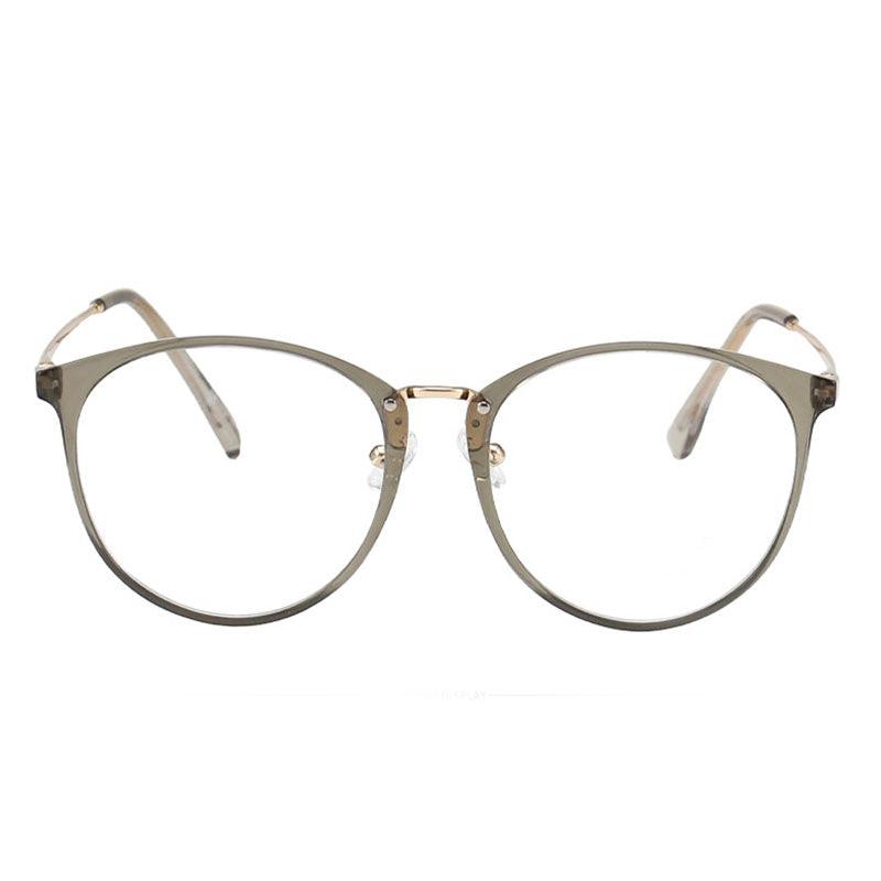 Infinity oversized vintage-inspired prescription eyeglasses, available in blue light blocking lenses and in readers with magnification, from EyeCandys. Pictured is the Matcha (green) color.
